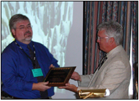 Jon Davidson accepting the Colborn Award from Dennis Stevenson