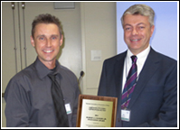 Kenneth A. Hansen (right) director Utah Division of Administrative Rules accepts the 2013 Colborn Award from ACR President Scott Cancelosi